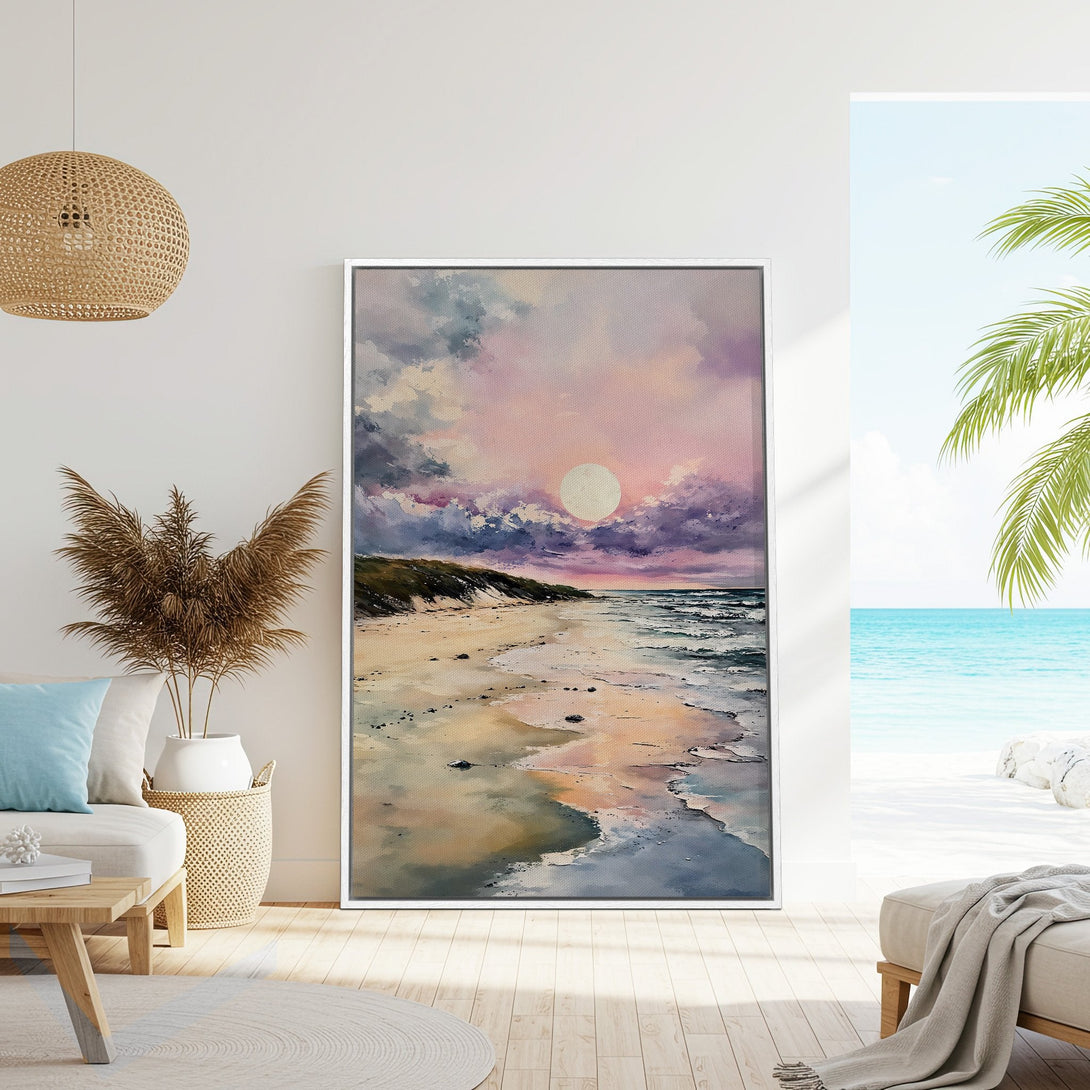 Framed Wall Art: Sunset beach scene in watercolor style. Features a pink, purple, and blue color palette. Perfect coastal decor for your home!