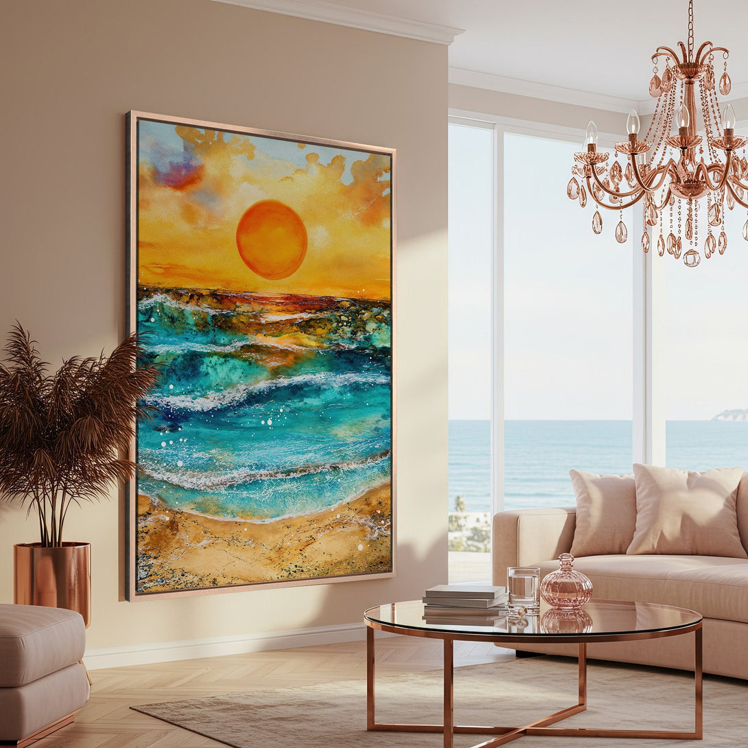 Framed Wall Art featuring a vibrant beach scene with turquoise waves and a golden sun. Coastal style art in warm yellow and blue tones, perfect for a living room.