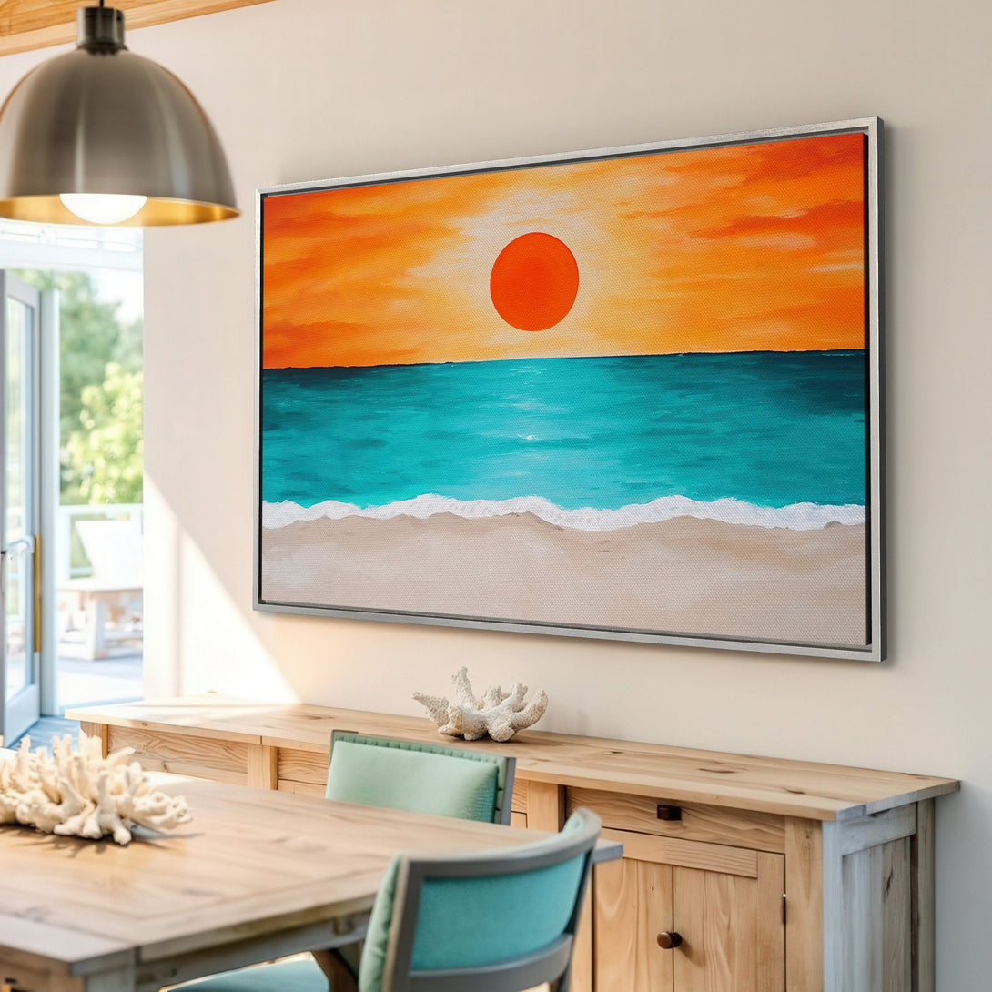 Framed Wall Art: Coastal sunset canvas print in vibrant orange, teal, and beige. Perfect beach decor for a calming, modern interior.