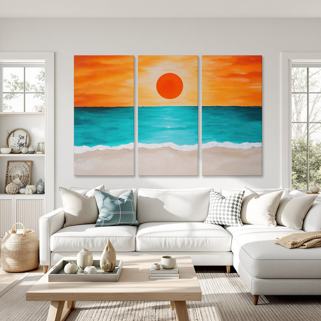 Canvas Print of a beach sunset in orange, turquoise, and beige, displayed in a modern living room. Perfect coastal wall art.