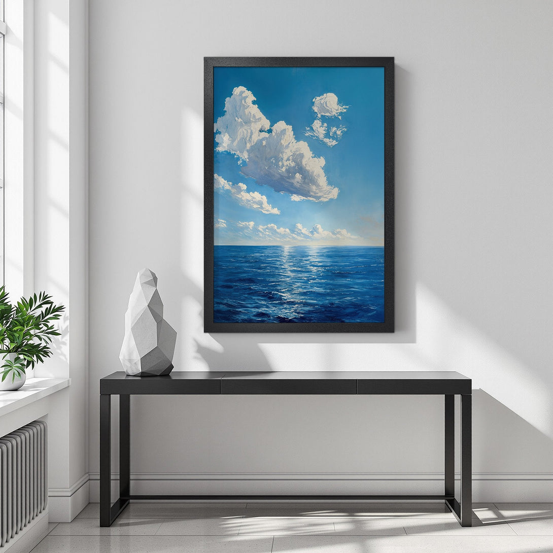 Framed Poster featuring a serene ocean and sky scene in blue and white. Perfect wall art to bring calm to your space.