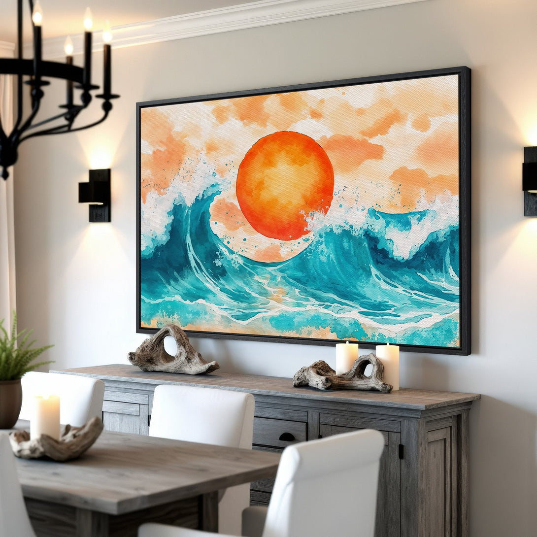 Framed Wall Art featuring a watercolor ocean scene with a vibrant orange sun. Coastal style art in teal, orange, and white adds a calming touch to any interior.