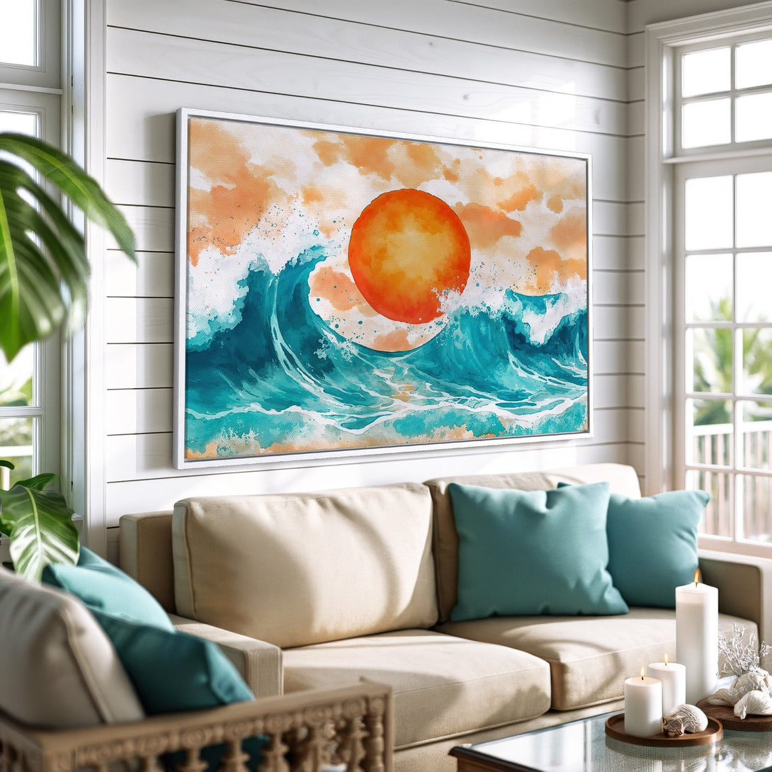 Framed Wall Art featuring an abstract watercolor ocean scene with a vibrant orange sun and turquoise waves. Coastal decor in a bright interior.
