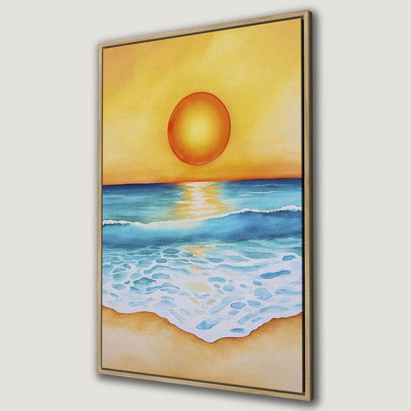 Framed Wall Art of a watercolor sunset over the ocean. Warm yellow and orange hues meet cool blues in this beautiful Canvas Print, perfect for coastal decor.