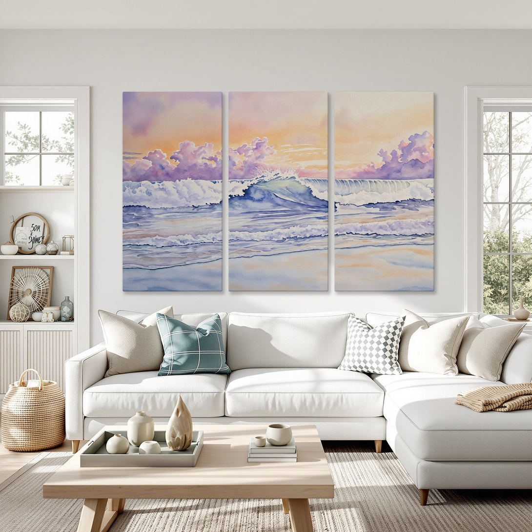 Canvas Print of a watercolor seascape, featuring a wave crashing against the shore. Soft pastel color palette of blues, purples, and oranges. Coastal wall art for your home.