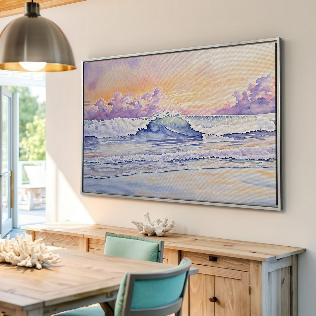 Framed Wall Art: Watercolor wave art in a coastal interior. Serene ocean scene with purple, blue, and peach hues. Perfect for beach house decor!