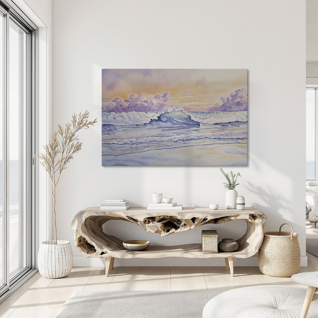 Framed Wall Art: Watercolor wave art in a coastal interior. Features a serene ocean scene with a pastel color palette of blues, purples, and golds.