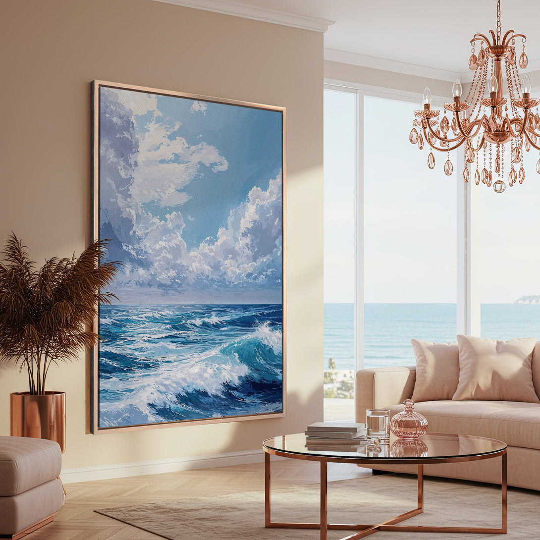 Framed Wall Art: Coastal waves canvas print in blues and whites, displayed in a serene living room. Perfect for adding a touch of ocean-inspired style!