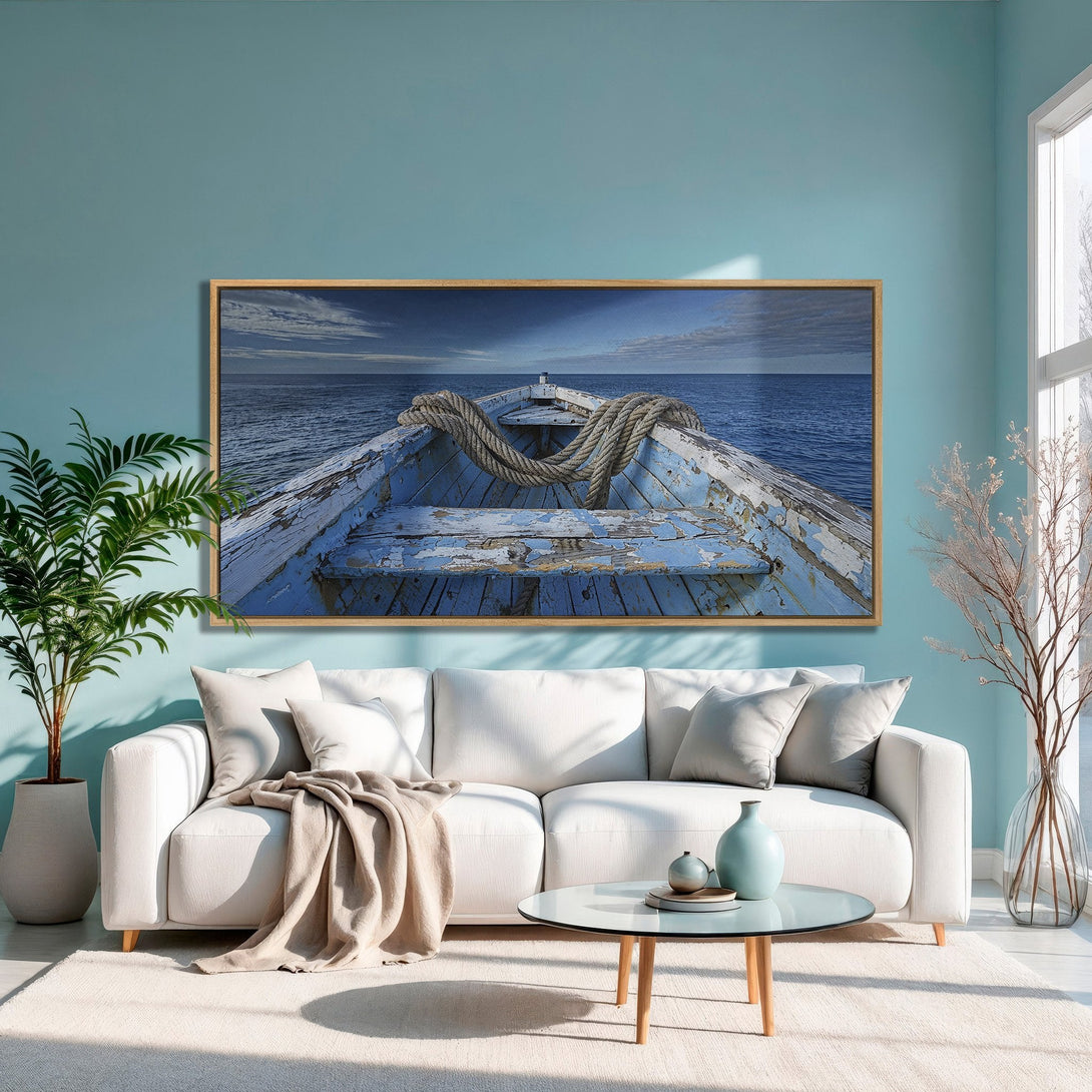 Framed Wall Art: Coastal boat scene in blue and neutral tones. Enhance your living room with this serene canvas print. Perfect for a calming, nautical vibe.