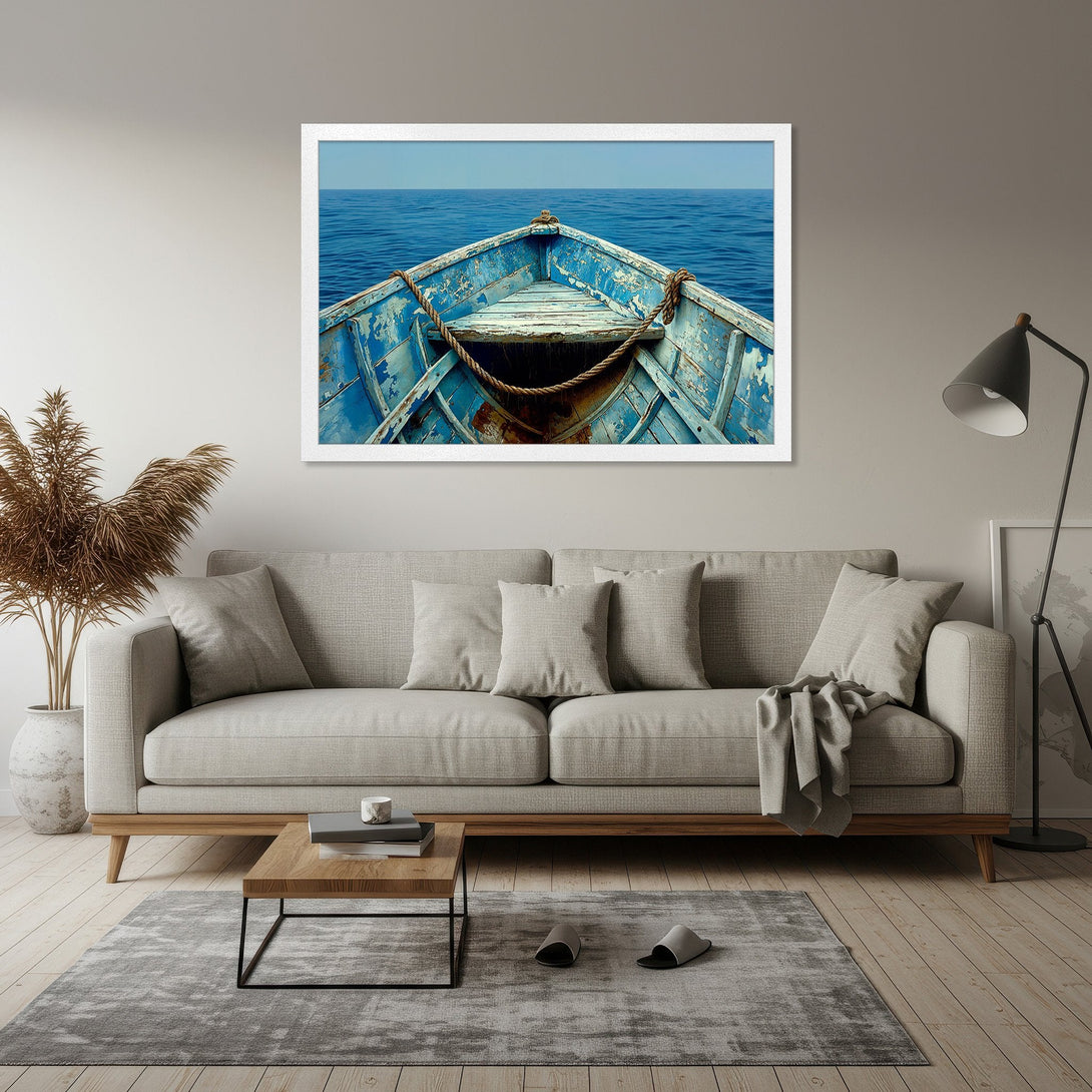 Framed Poster of a boat on the ocean, featuring a blue and neutral color palette. Coastal art style for a serene home decor.