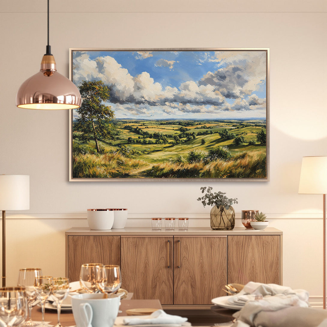 Framed Wall Art: Landscape painting with green fields, blue sky, and dramatic clouds. Adds a touch of nature and serenity to any room.