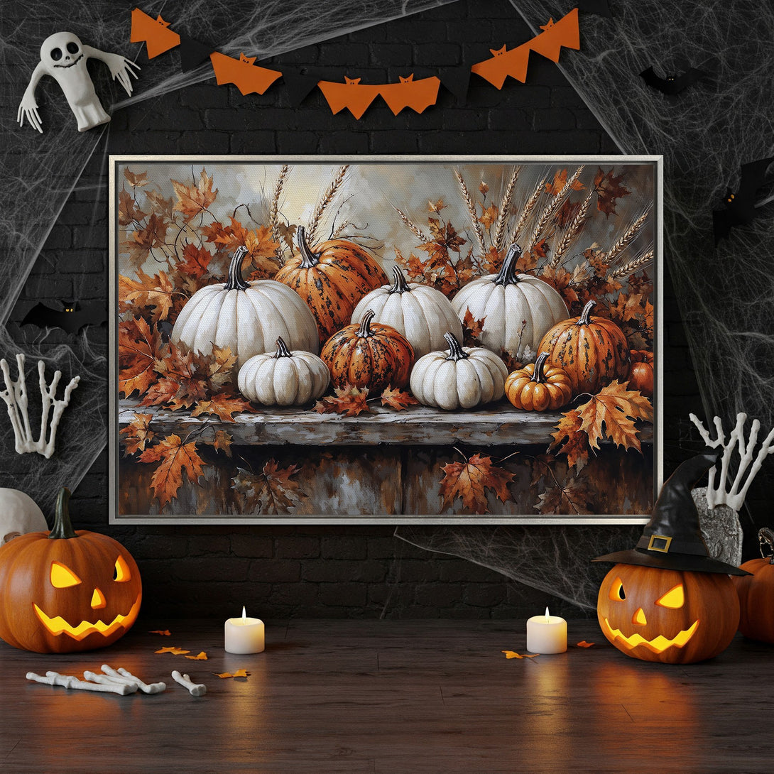 Framed Wall Art featuring pumpkins and autumn leaves in warm orange and white tones. Perfect fall decor for a cozy, festive interior.