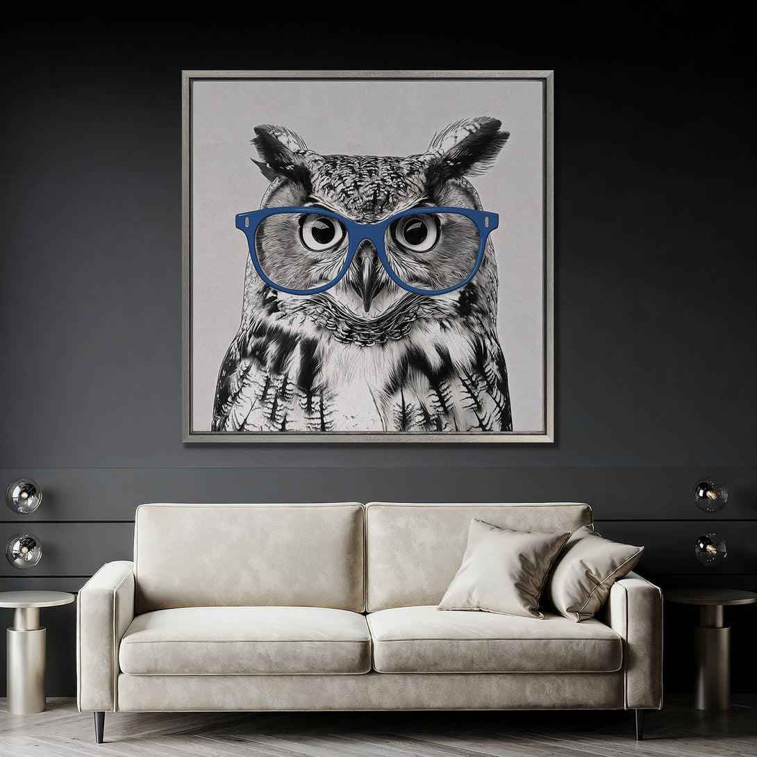 Framed Wall Art: Stylish owl portrait with blue glasses. Monochrome artwork with a pop of color. Perfect for modern home decor.
