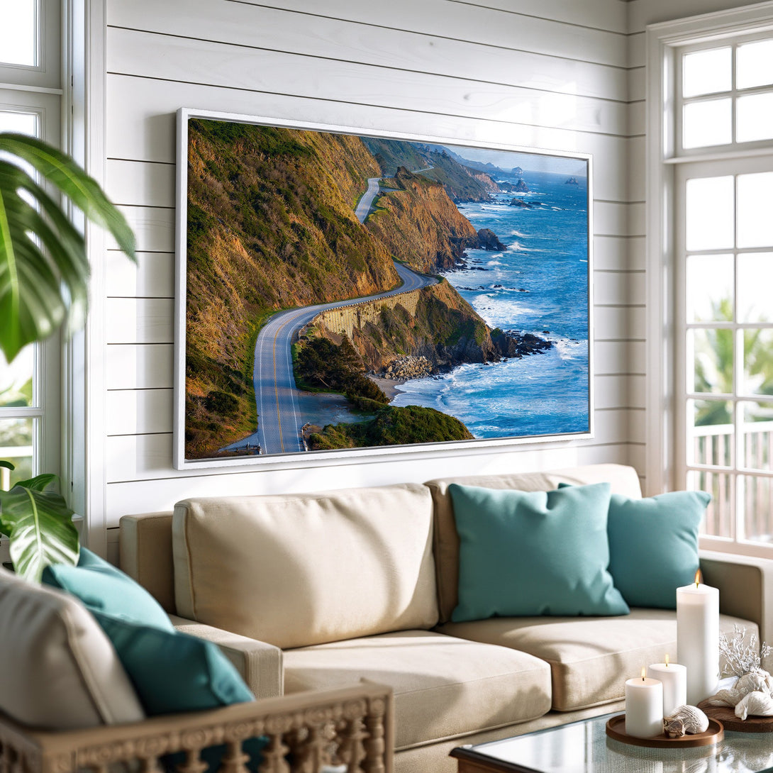 Framed Wall Art of a scenic coastal road. Earthy tones with vibrant blues and greens create a calming, modern aesthetic. Perfect for living room decor.
