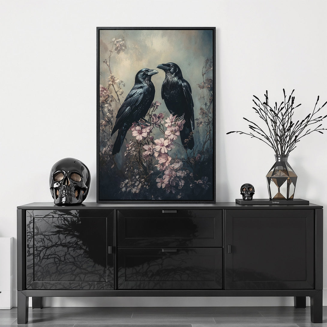 Framed Wall Art featuring two ravens on a floral branch, with a moody, dark, and romantic color palette. Perfect for adding a touch of gothic elegance.