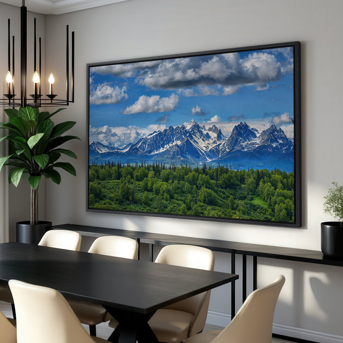 Framed Wall Art of mountain landscape in a dining room. Blue, green, and white color palette. Bring nature indoors with this stunning canvas print!
