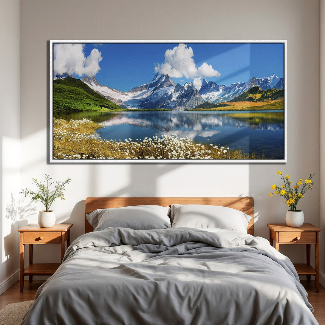 Framed Wall Art of a serene mountain lake landscape in blue, green, and white tones. Perfect for bedroom decor, this Canvas Print brings nature's beauty indoors.