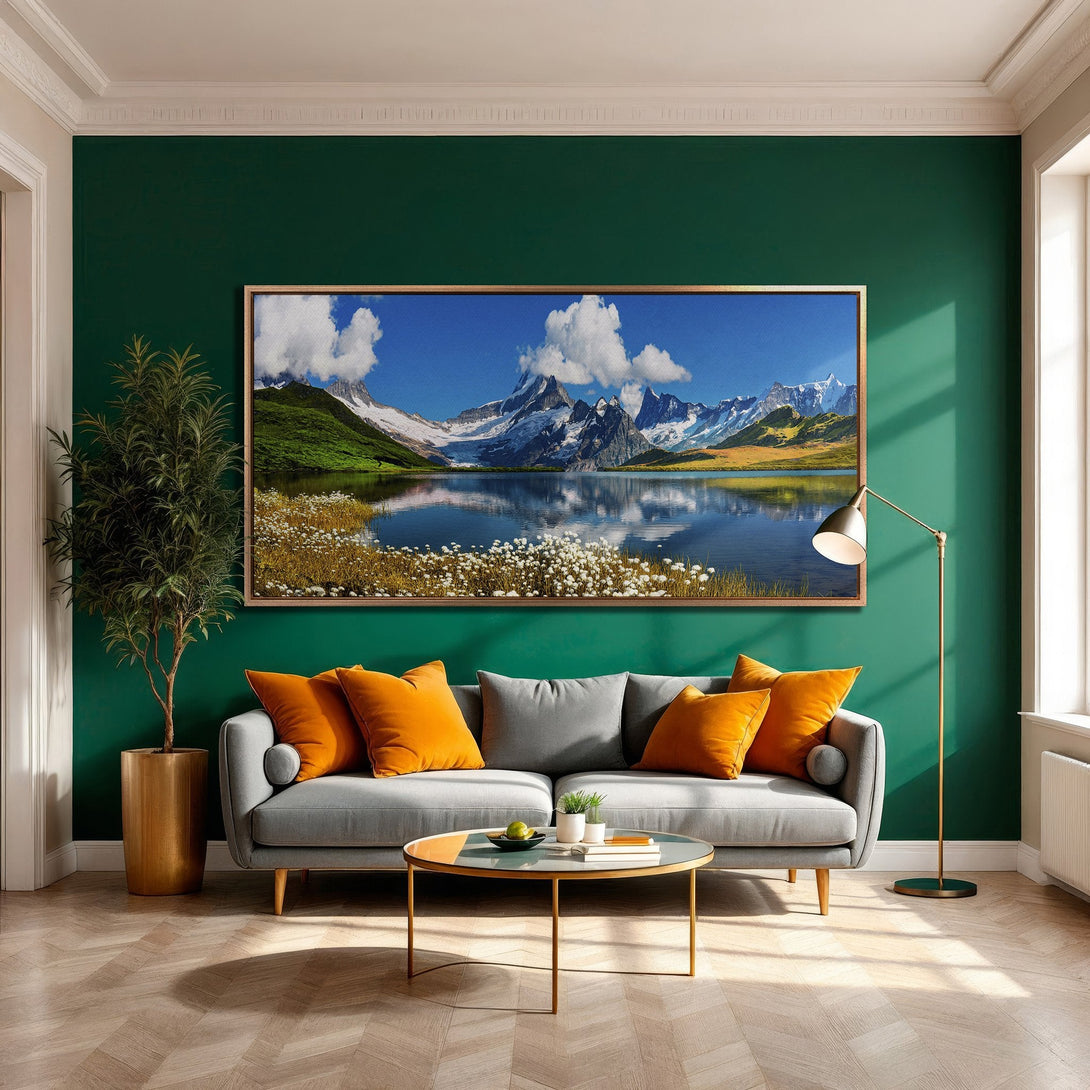 Framed Wall Art: Stunning mountain landscape Canvas Print in a modern living room. Features blue, green, and white tones, creating a serene and stylish atmosphere.