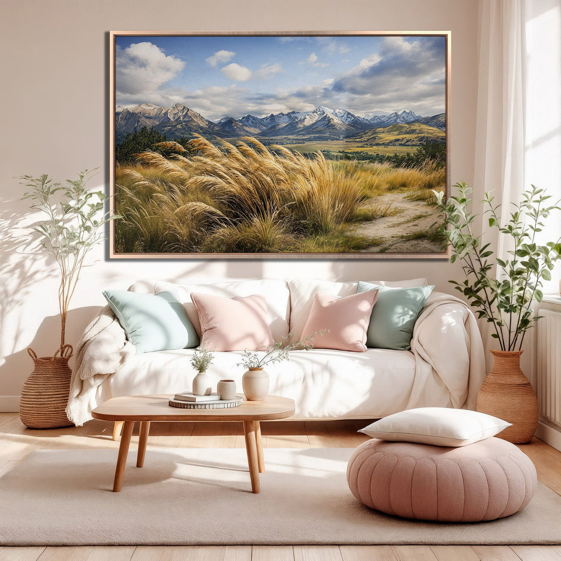Framed Wall Art: Stunning mountain landscape canvas print in a cozy living room. Featuring a serene blue, gold, and neutral color palette, perfect for home decor.