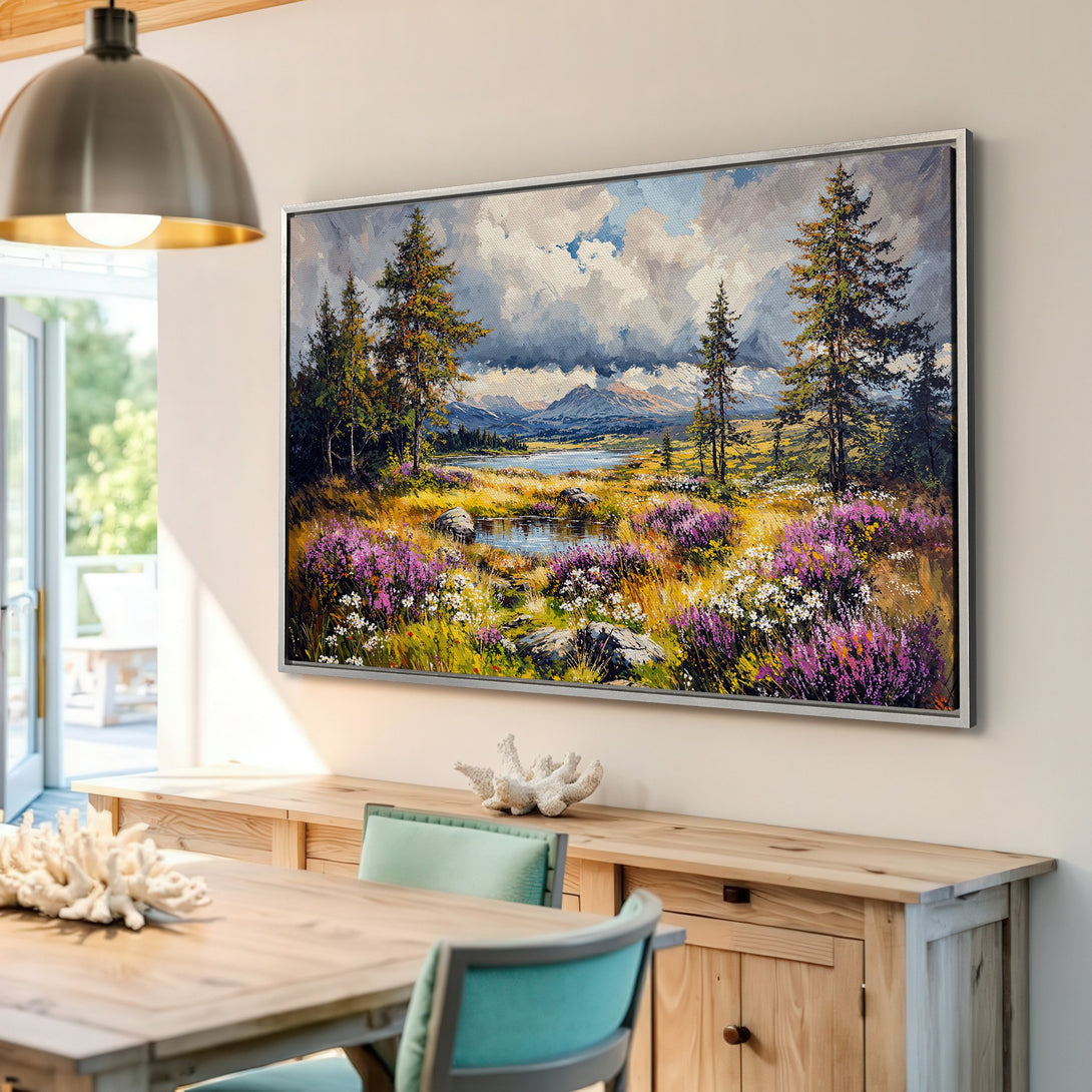 Framed Wall Art: Landscape painting with vibrant purple wildflowers, lush greens, and mountain backdrop. Adds a touch of nature's beauty to your home.