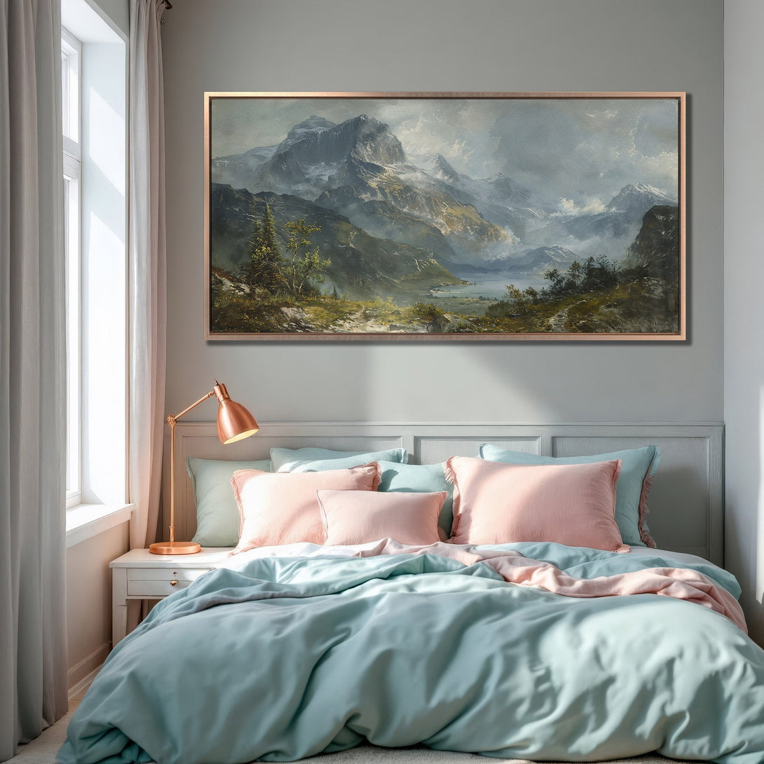 Framed Wall Art featuring a majestic mountain landscape in muted blues and greens. Perfect for adding a touch of classic art to your bedroom decor.