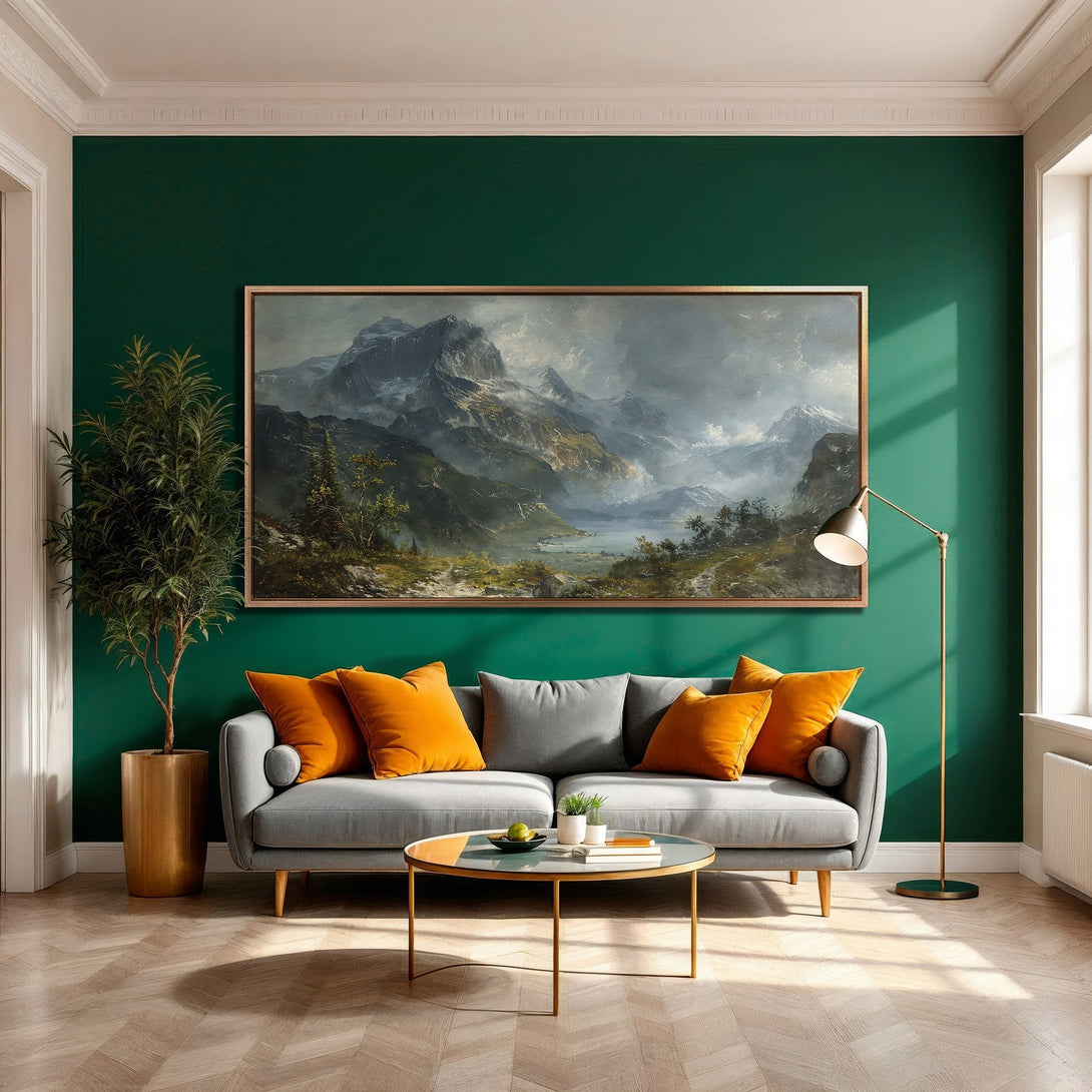 Framed Wall Art: Mountain landscape canvas print in a living room with a green wall, gray sofa, and orange accents. Classic style, neutral and warm tones.