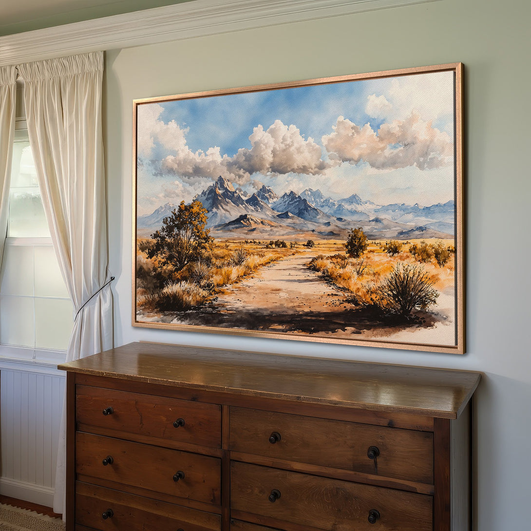 Framed Wall Art: Watercolor landscape Canvas Print with mountains, road, and clouds. Earthy tones of brown, blue, and yellow. Perfect for home decor.