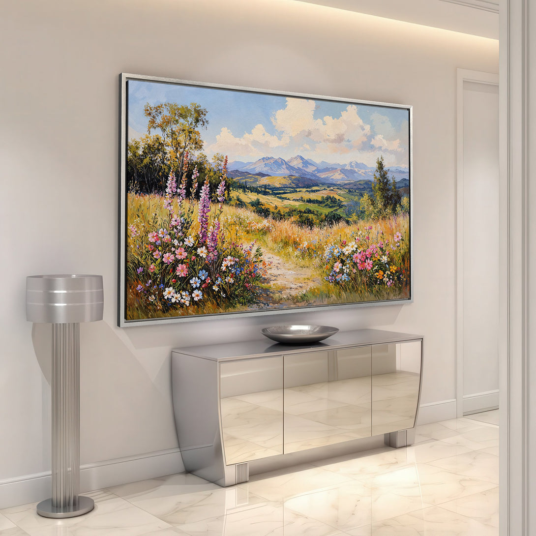 Framed Wall Art: Landscape Canvas Print with vibrant wildflowers, mountains, and a path. Warm, natural color palette to brighten any space.