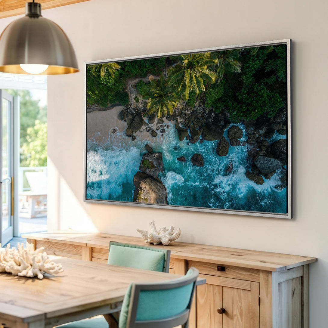 Framed Wall Art featuring a stunning aerial view of a tropical beach. Coastal decor with vibrant teal and green hues. Bring the ocean home!