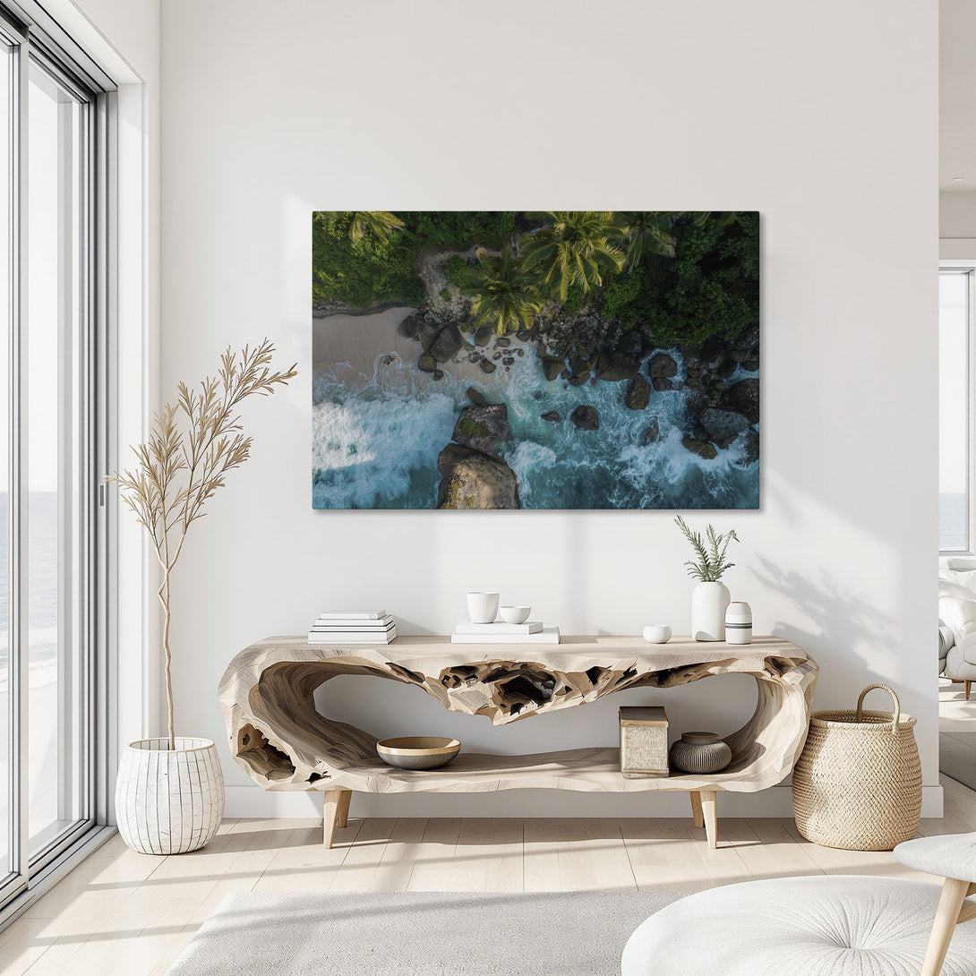 Framed Wall Art: Aerial view of a tropical beach with vibrant teal water and lush green palm trees. Coastal decor with a gold frame.