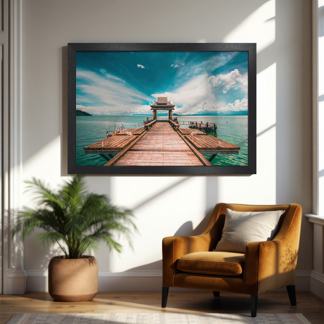 Framed Poster featuring a serene pier over turquoise water under a cloudy sky. Coastal style with blue, brown, and teal tones. Perfect wall art.