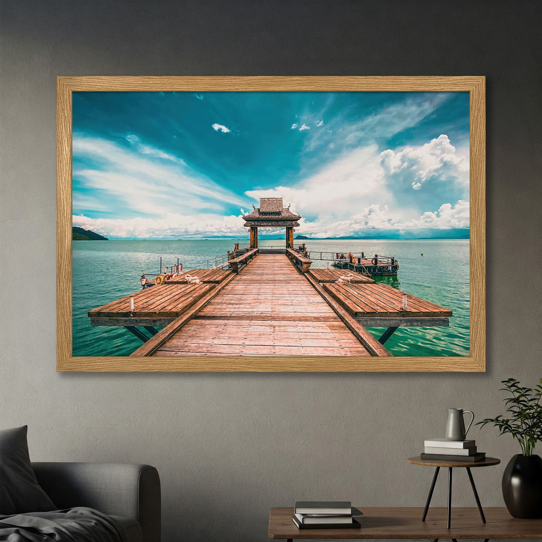Framed Poster of a wooden pier over turquoise water with a blue sky, a serene and inviting art piece.