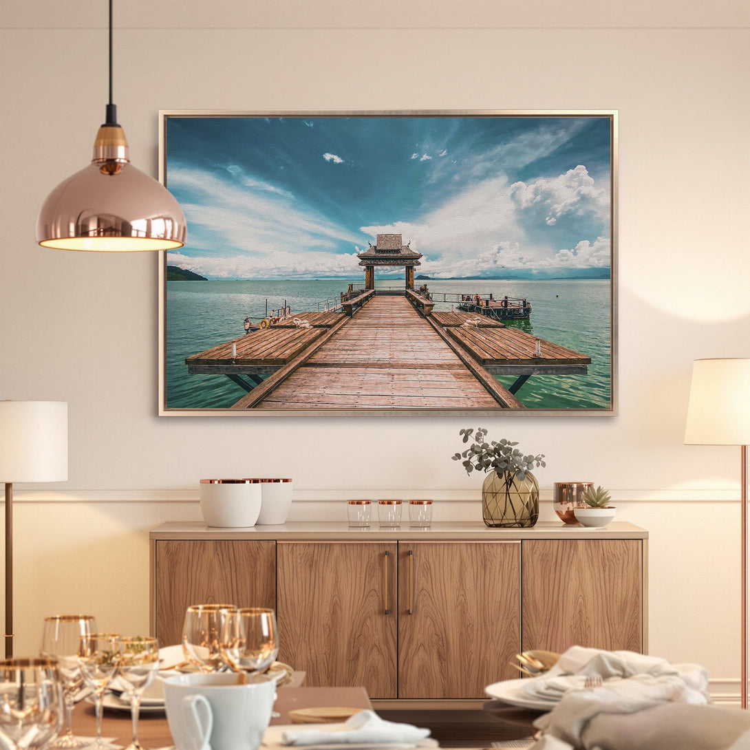 Framed Wall Art: Serene pier scene in teal and brown. Coastal landscape Canvas Print adds a calming touch to any interior. Shop now!