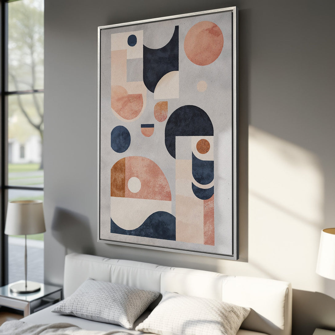 Framed Wall Art: Modern abstract art print in a bedroom. Features geometric shapes in muted blue, peach, and brown hues. Perfect for contemporary decor.