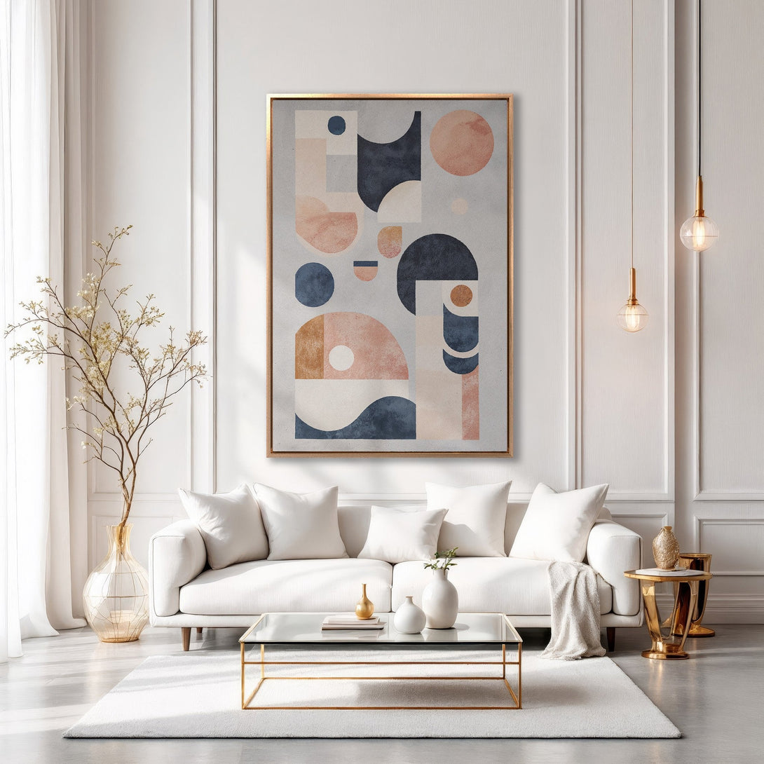Framed Wall Art featuring a modern abstract design in blush, navy, and gold, displayed in a chic, minimalist living room setting.