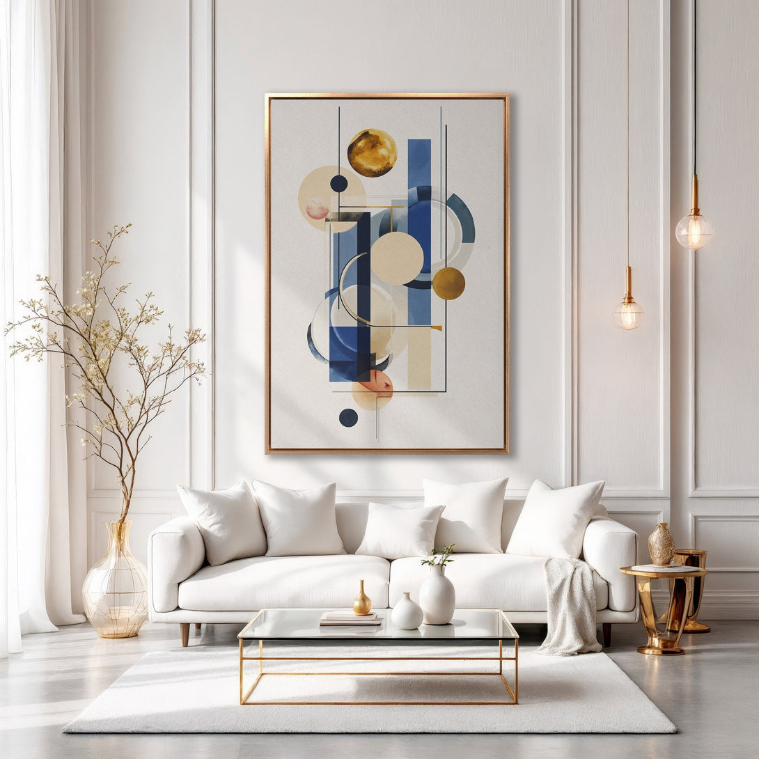 Framed Wall Art: Abstract geometric design in blue, gold, and beige. Modern Canvas Print adds elegance to a white living room interior.