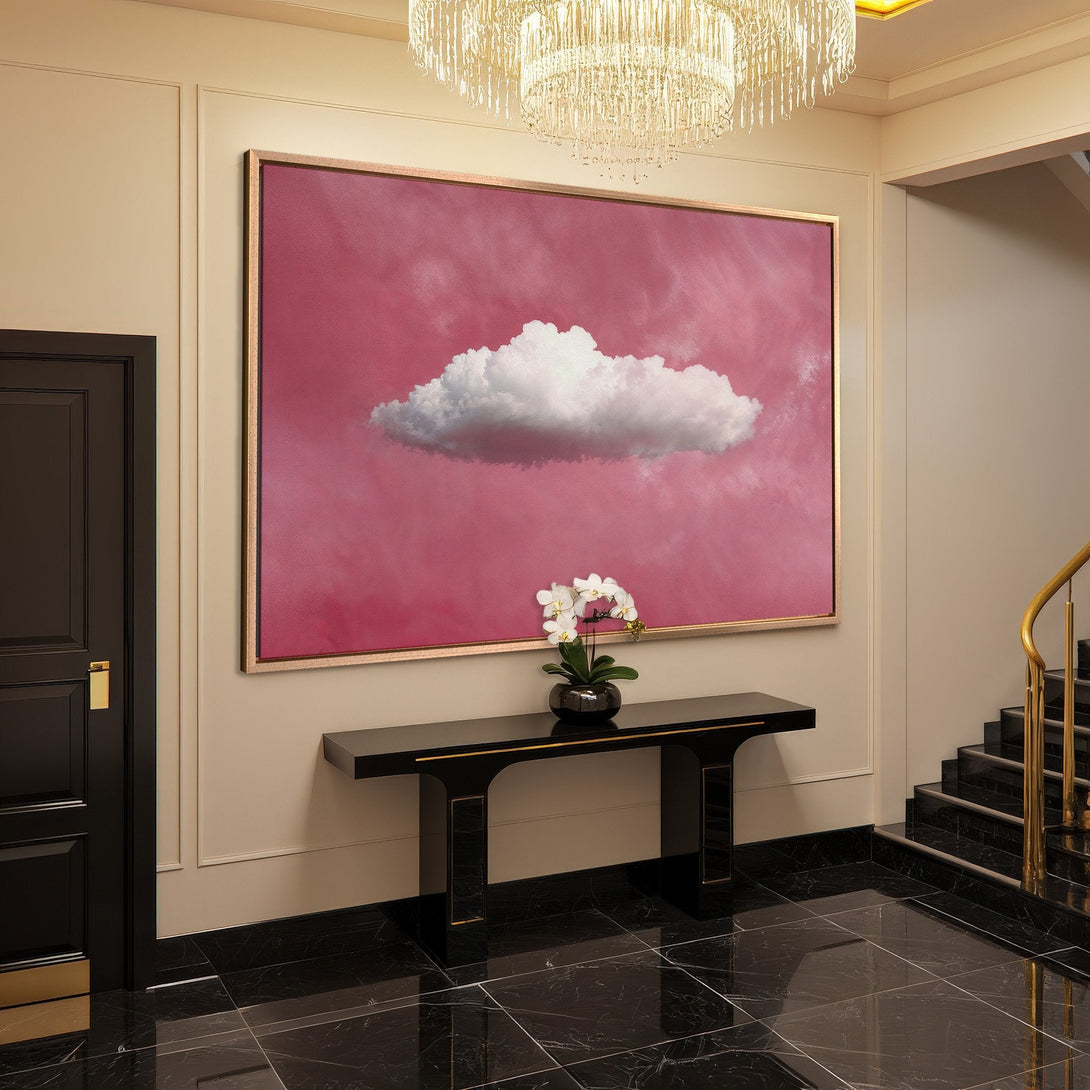 Framed Wall Art featuring a cloud on a pink sky. Modern style with a vibrant color palette, perfect for adding a pop of color to your home.