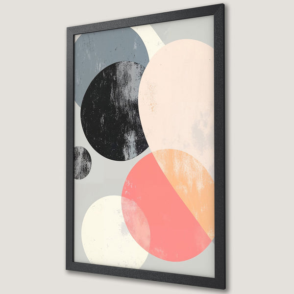 Framed Poster featuring abstract geometric art with circles in a muted color palette of pink, black, and gray. Modern wall art.
