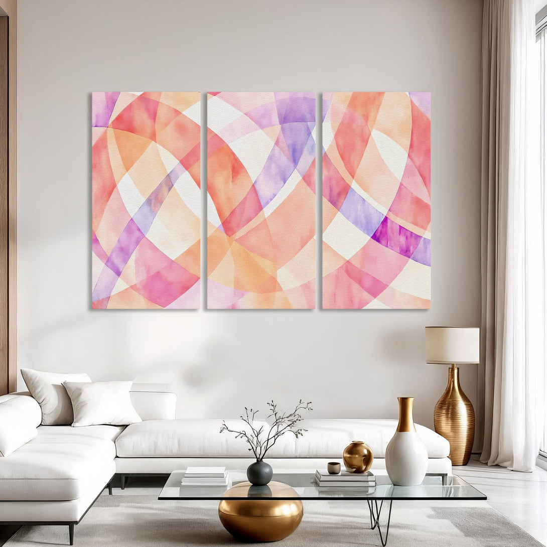 Abstract Canvas Print in warm watercolor tones. Features a modern design with pink, orange, and purple hues. Perfect for adding a pop of color to any space.
