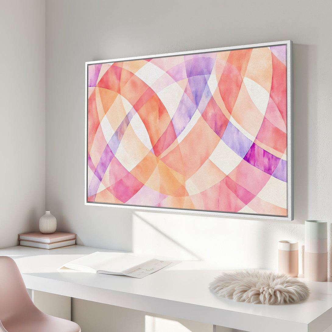 Framed Wall Art featuring an abstract watercolor design in warm pink, orange, and purple hues. Modern art for a stylish interior.