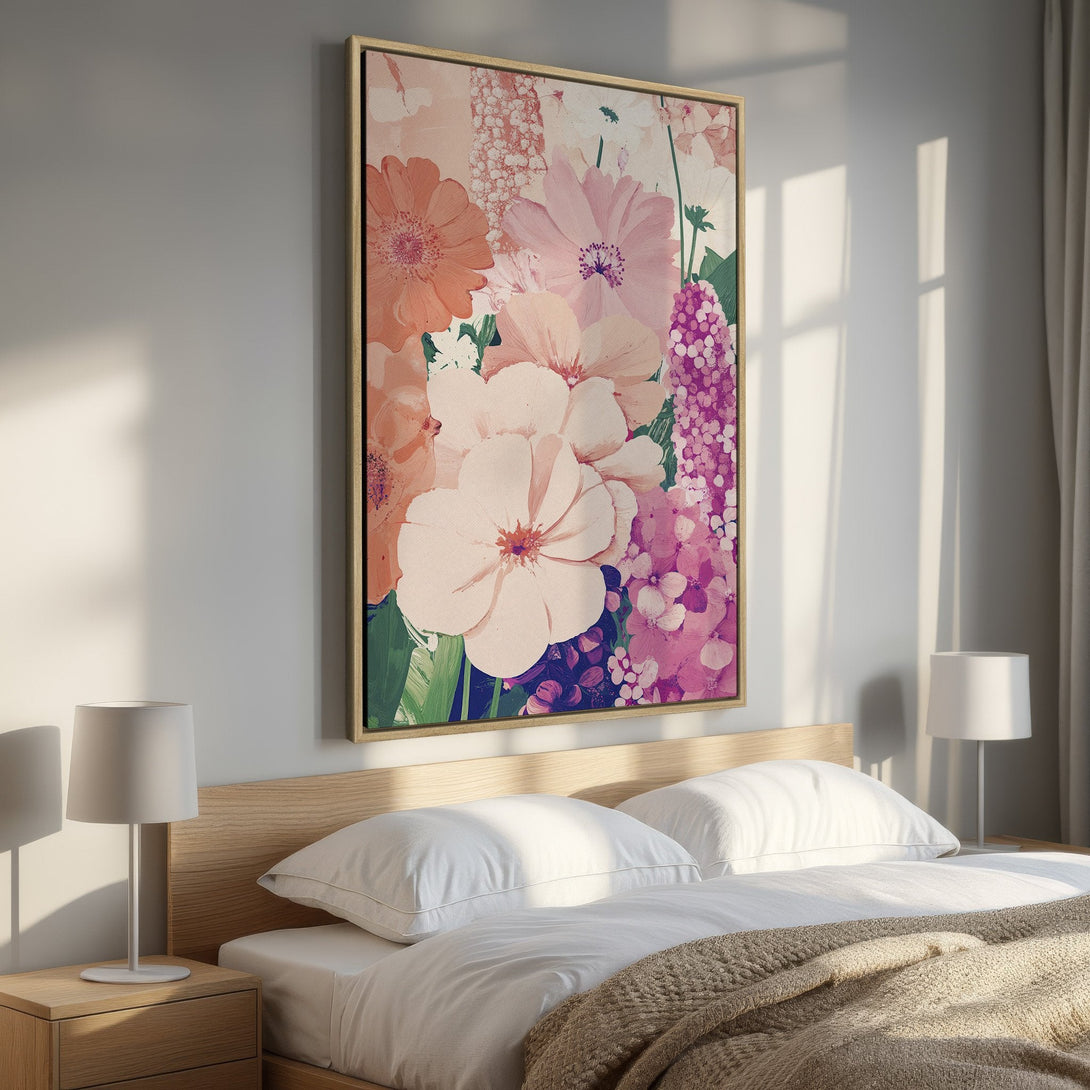 Framed Wall Art: Floral Canvas Print in a bedroom. Soft, modern style with a pink, peach, and purple color palette. Perfect for adding a touch of elegance.