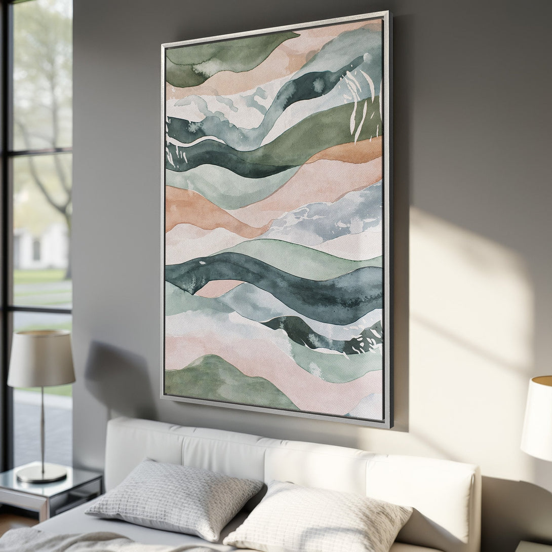 Framed Wall Art featuring an abstract watercolor landscape in muted green, pink, and blue tones. Perfect for adding a touch of modern art to your home decor.