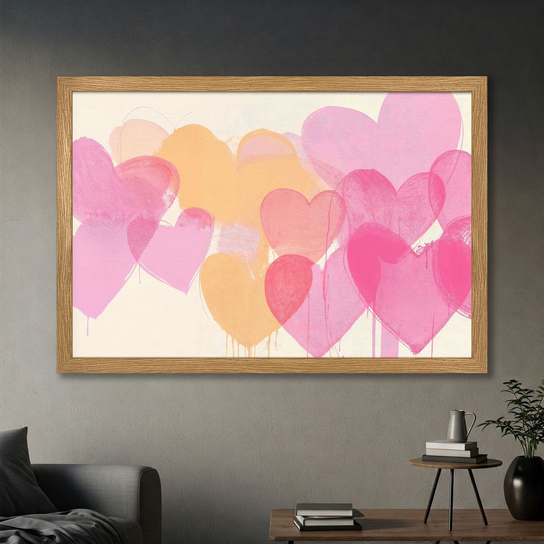 Framed Poster featuring abstract hearts in pink and orange hues. Modern art style, perfect for adding a touch of love to your space!