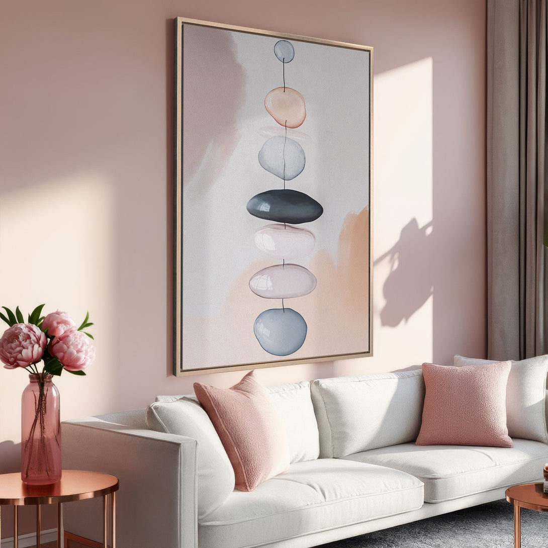 Framed Wall Art featuring abstract watercolor stones in soft blush and neutral tones. Modern decor for a calming living room.