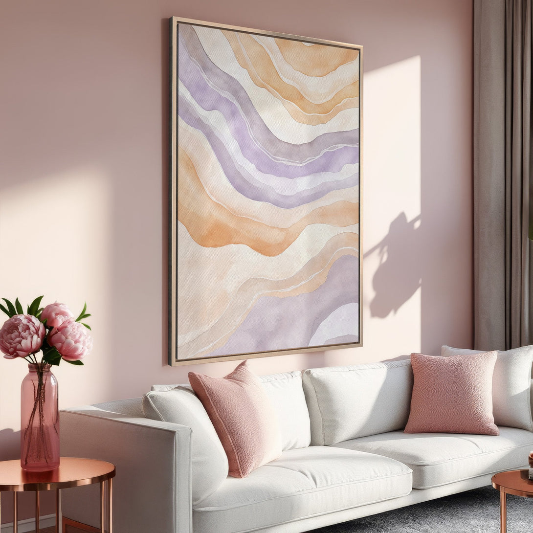 Framed Wall Art featuring abstract watercolor waves in soft peach and lavender tones. Perfect for adding a touch of modern elegance to your living room.