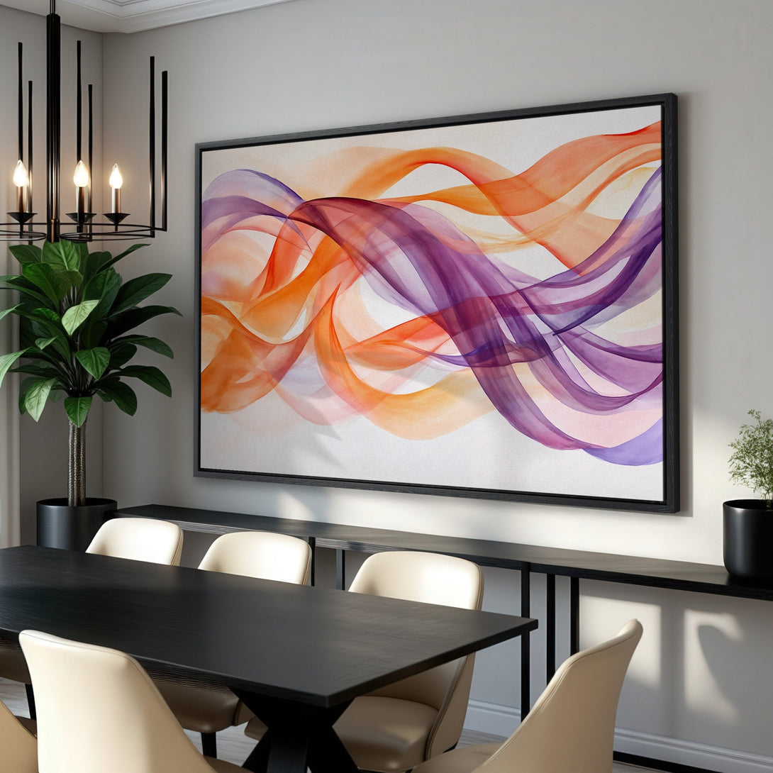 Framed Wall Art featuring abstract flowing ribbons in orange and purple hues. Modern canvas print adds a pop of color to any interior design.