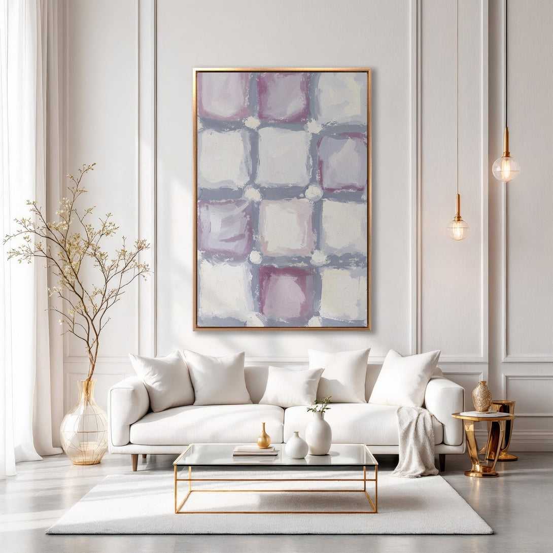 Framed Wall Art: Abstract grid pattern in soft pinks, grays, and white. Modern art canvas print adds elegance to a minimalist living room.