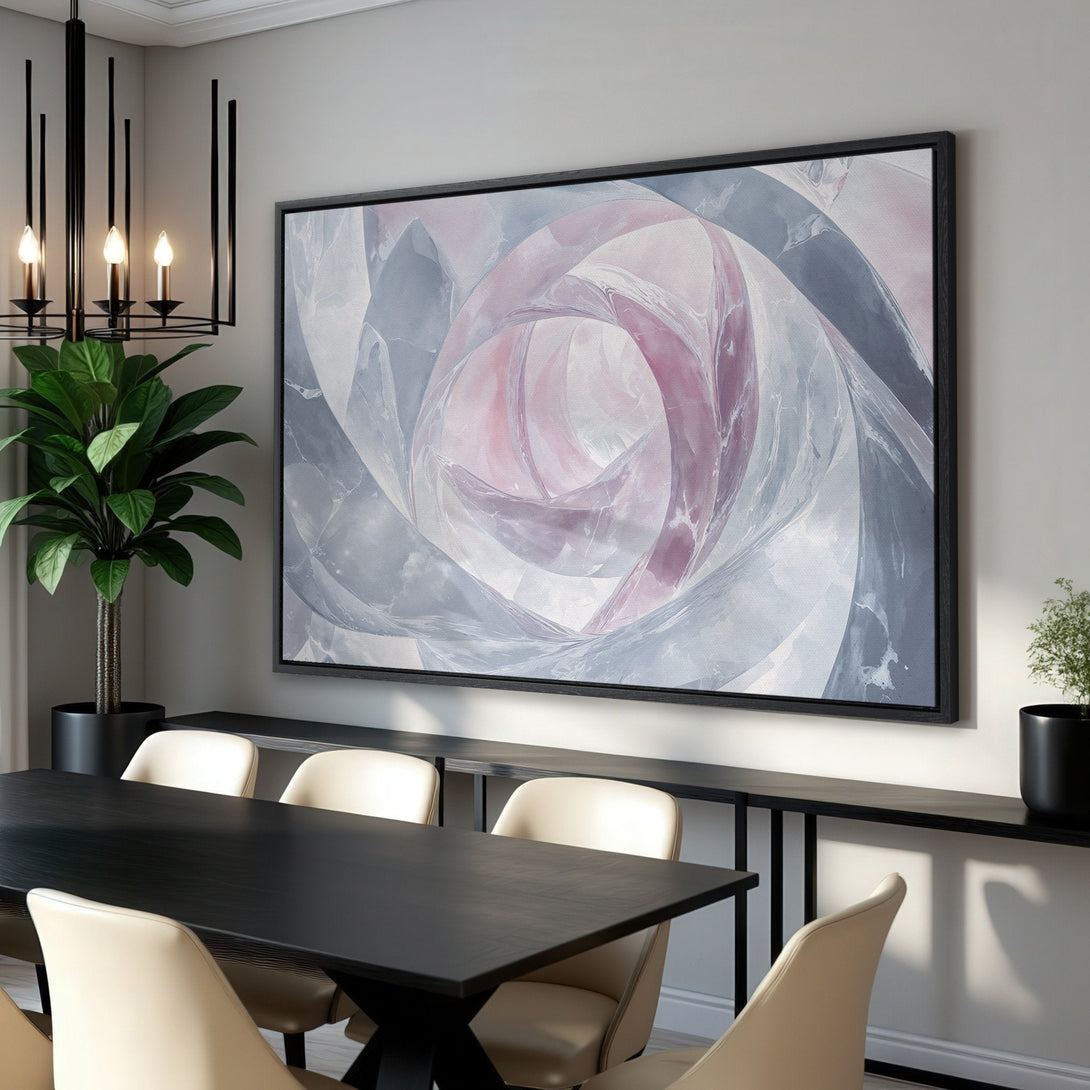Framed Wall Art featuring an abstract swirl design in a soft pink and gray palette. Modern canvas print adds elegance to any dining room.
