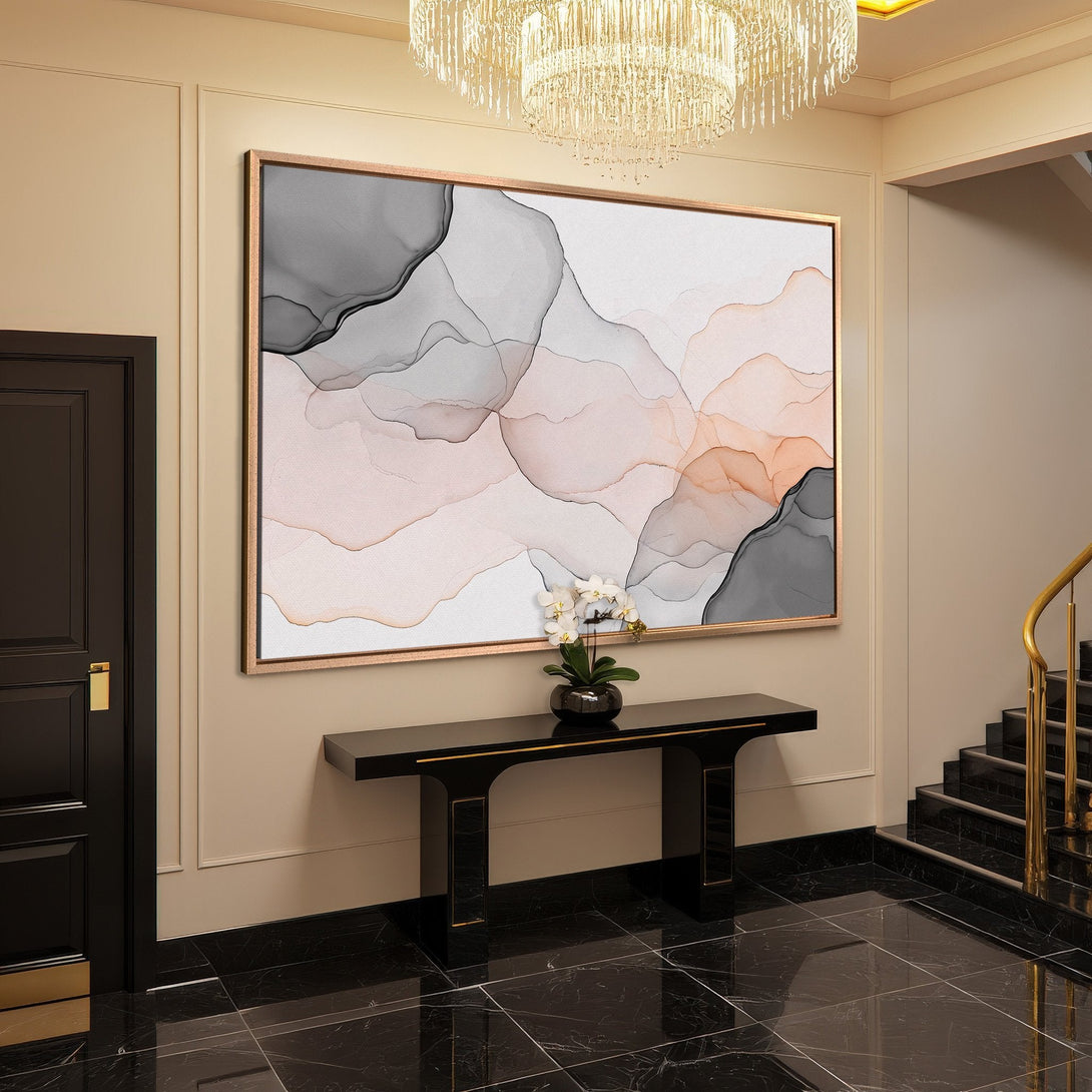 Framed Wall Art featuring an abstract watercolor design in neutral tones of gray, blush, and peach. Modern art for elegant home decor.