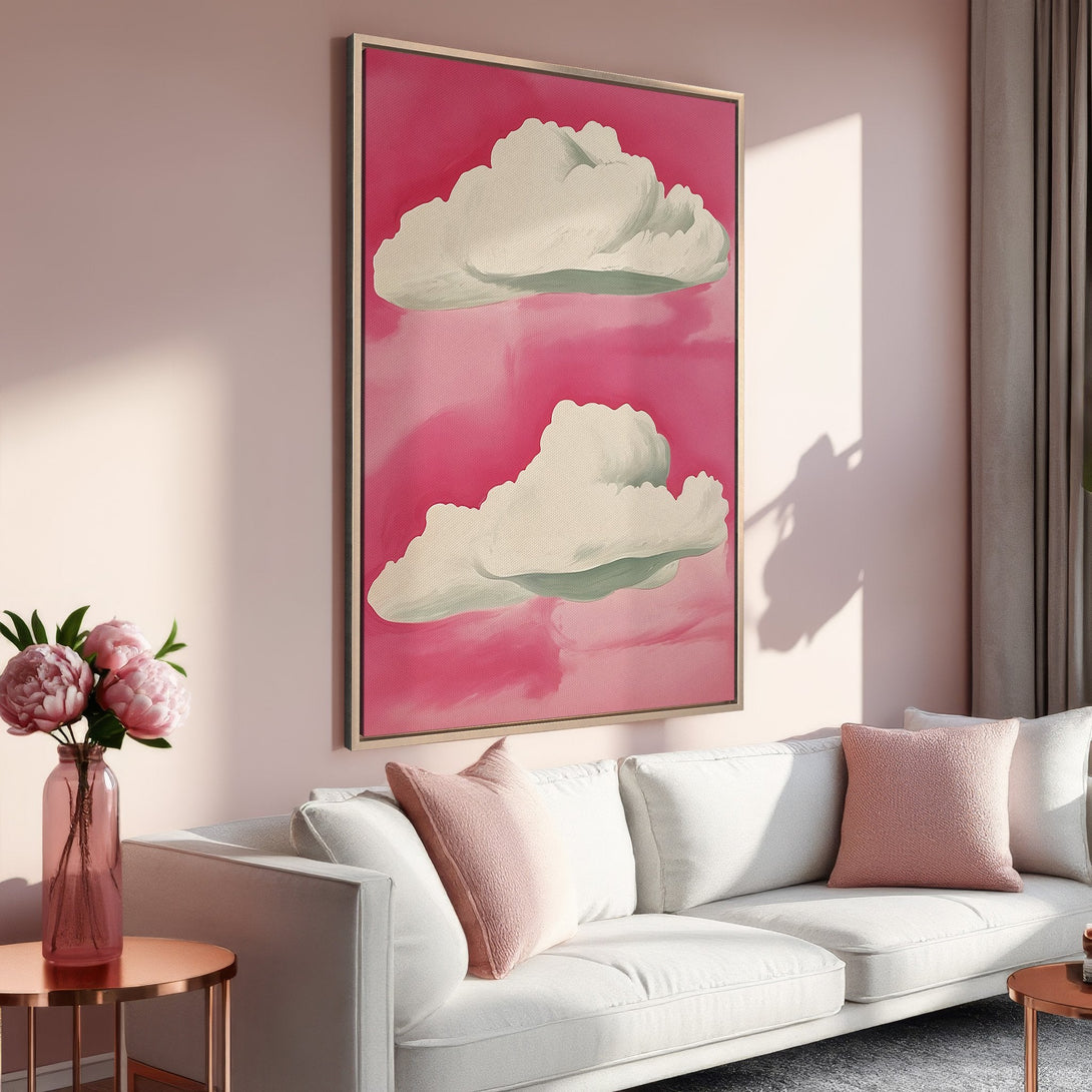Framed Wall Art featuring dreamy cloud painting in pink and white hues. Perfect for adding a touch of modern art to your living room decor.